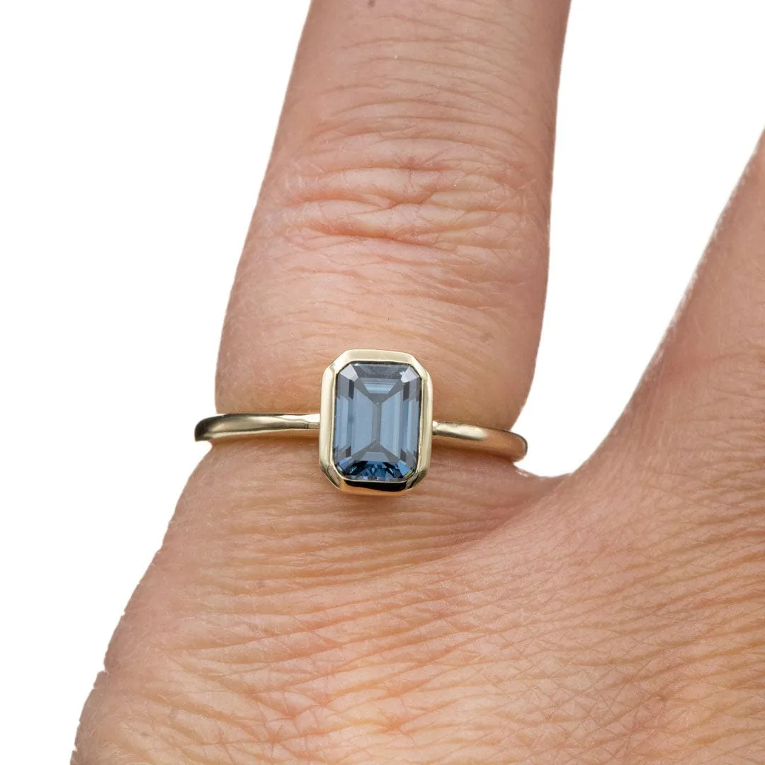 Emma Bezel Set Blue-Gray Emerald Cut Moissanite Solitaire Engagement Ring