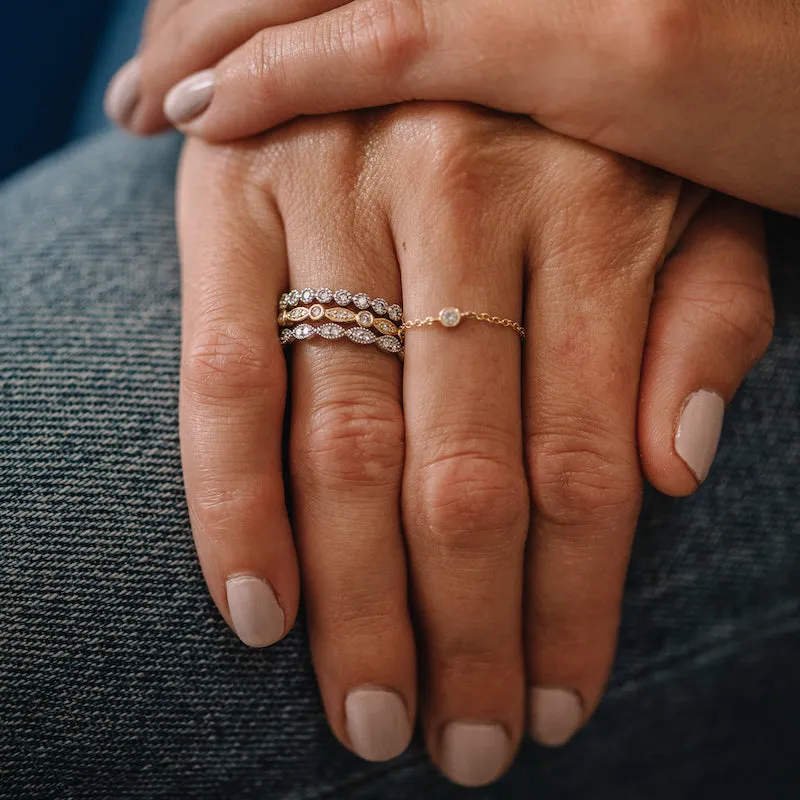 Marquise Shaped and Round Diamond Bezel Eternity Band