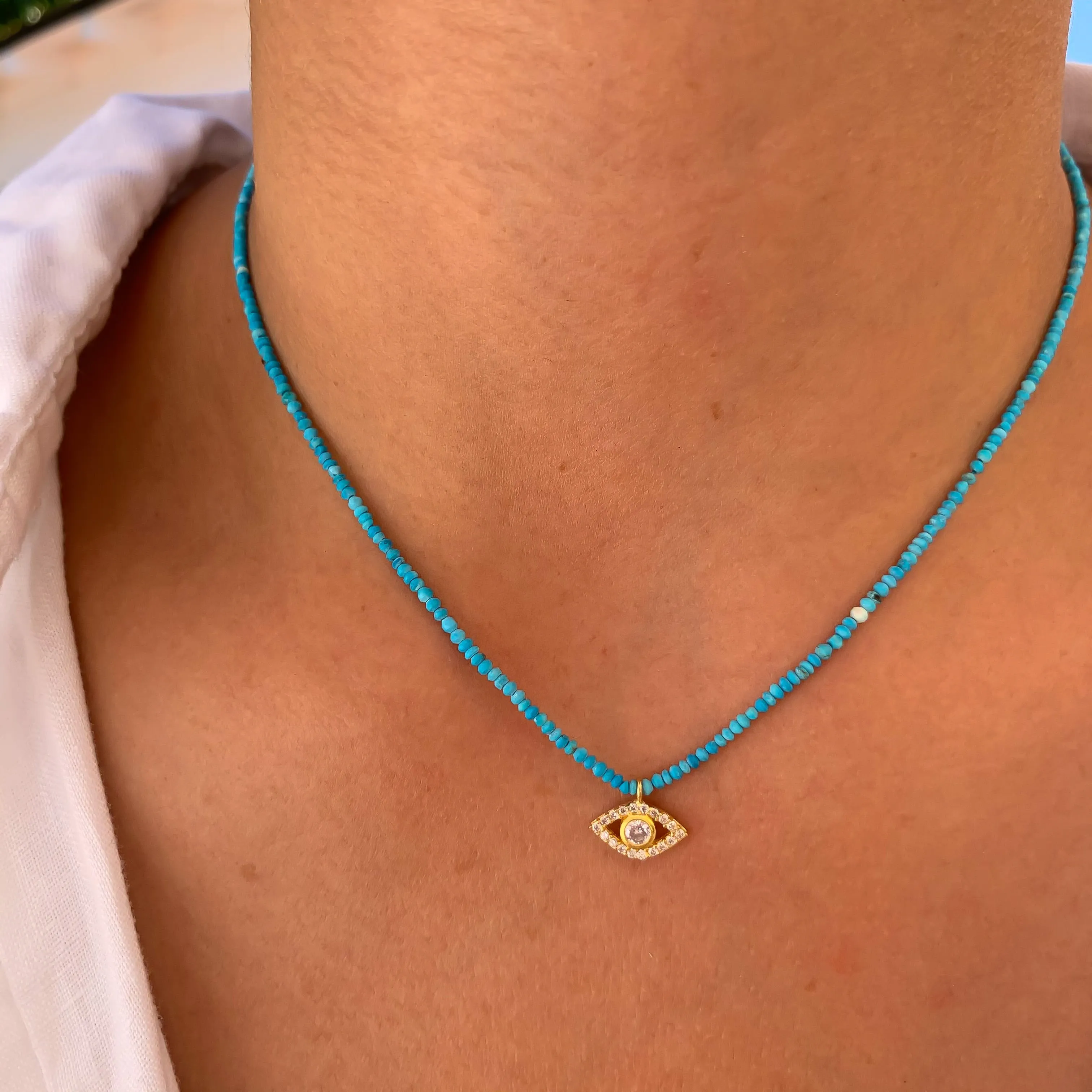 Natural turquoise beaded evil eye necklace